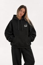 Polerón Essential Pin 2.0 Flaw - Negro - mujer en estudio - frente