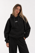 Polerón Essential Flaw - Negro - mujer en estudio - frente